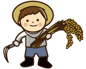 稲刈りをする少年